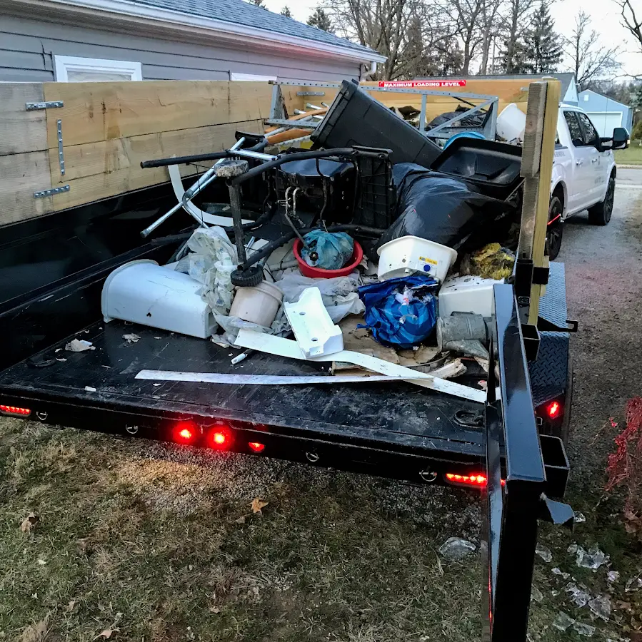 Roll-off dumpster delivered to a residential driveway in McAlester
